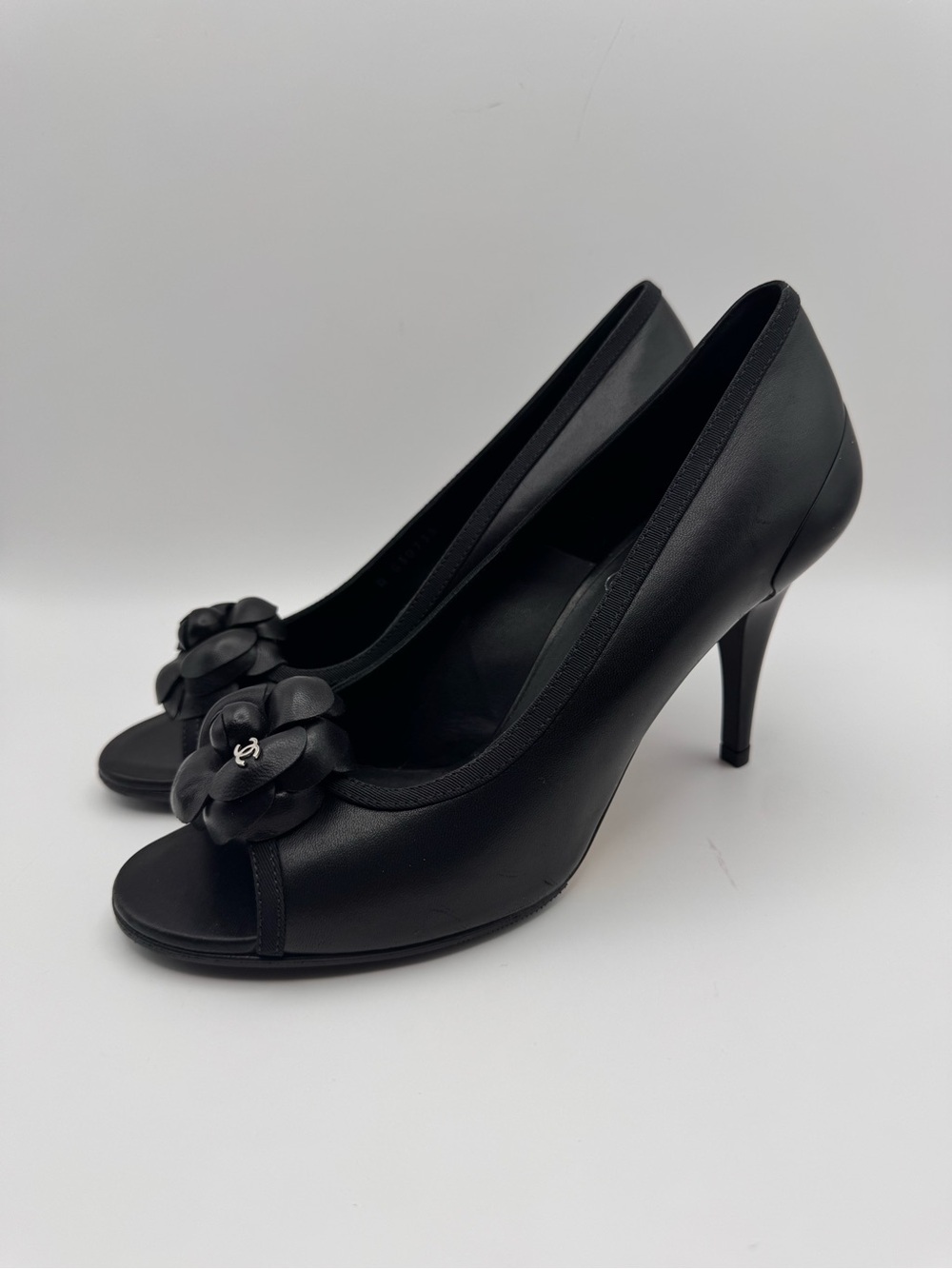 CHANEL Black Leather Camellia CC Open Toe Pumps Heels Size 37.5